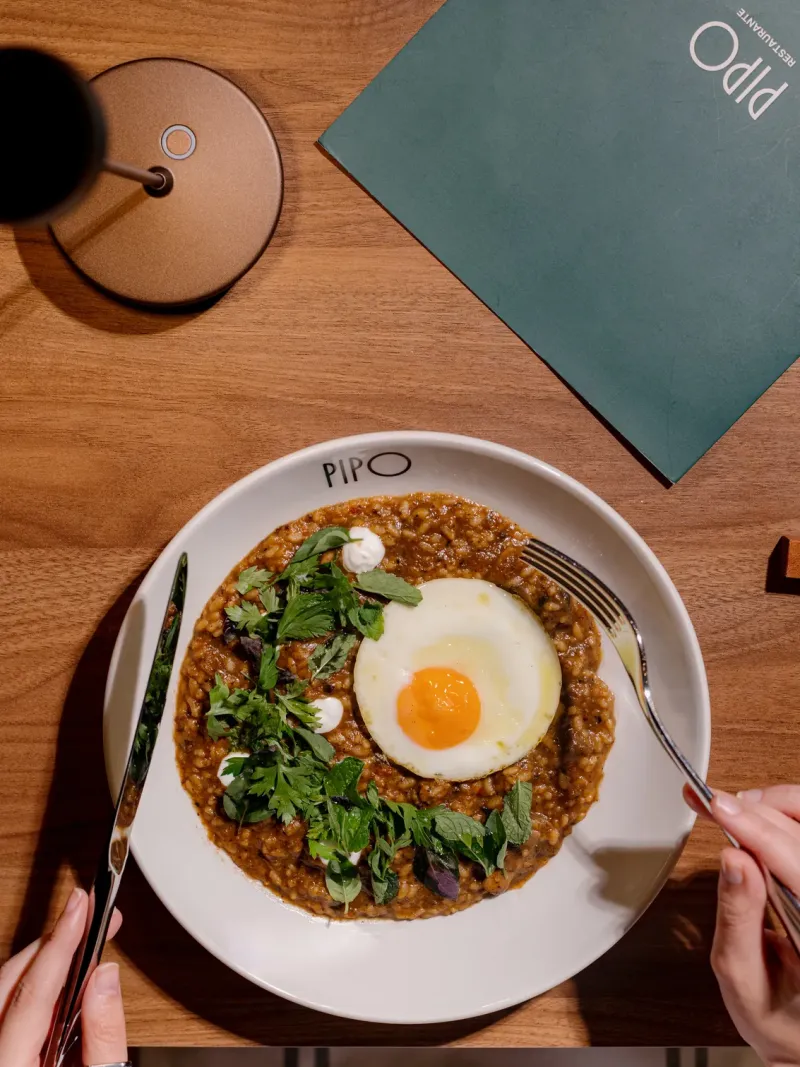 Creamy rice served at the table
