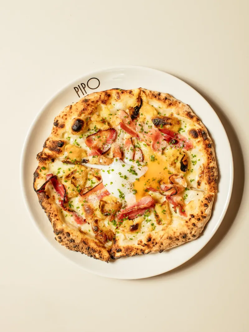Pizzas created four-handed by Felipe Bronze and Paul Cho.