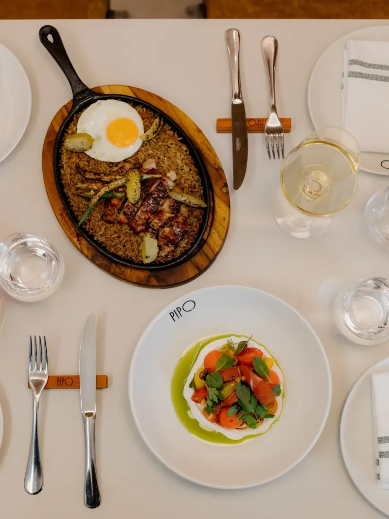 Creamy rice, crisp-fried egg and very fresh herbs.